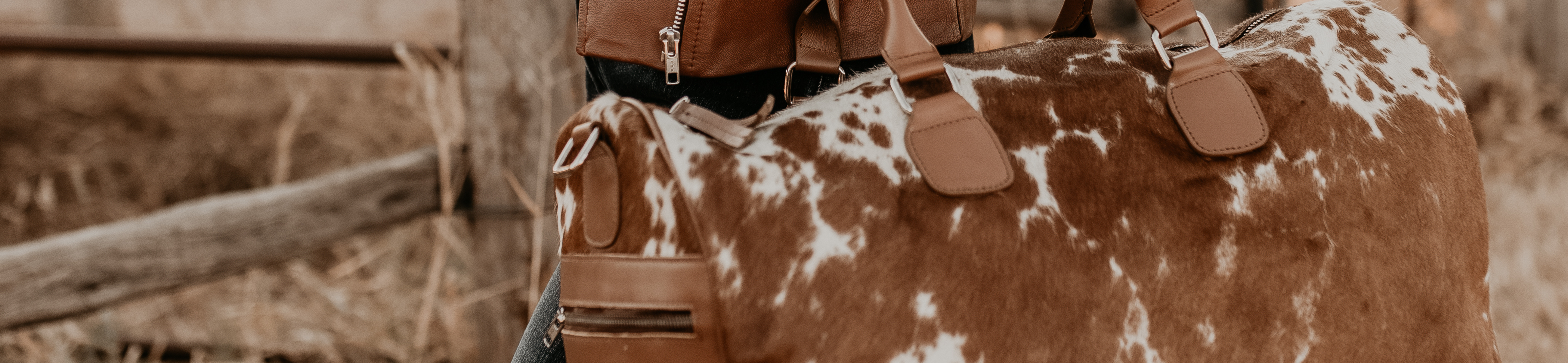 cow hide - leather - bag - travel - overnight - weekend away - duffle bag - the conron store 