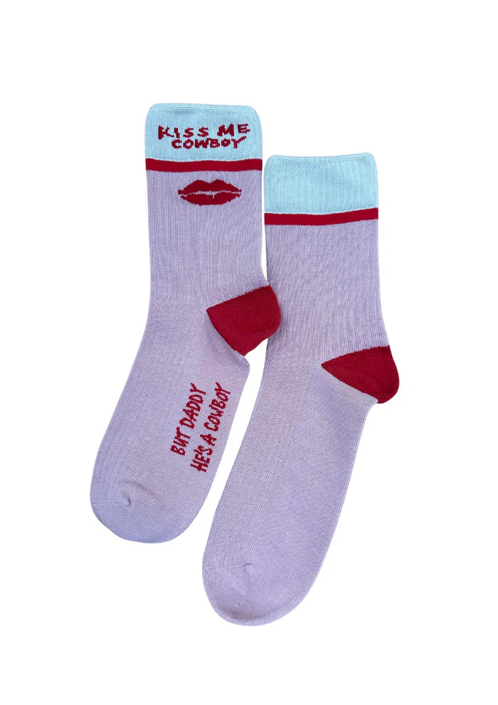 Pair of socks with text and lip print on a white background